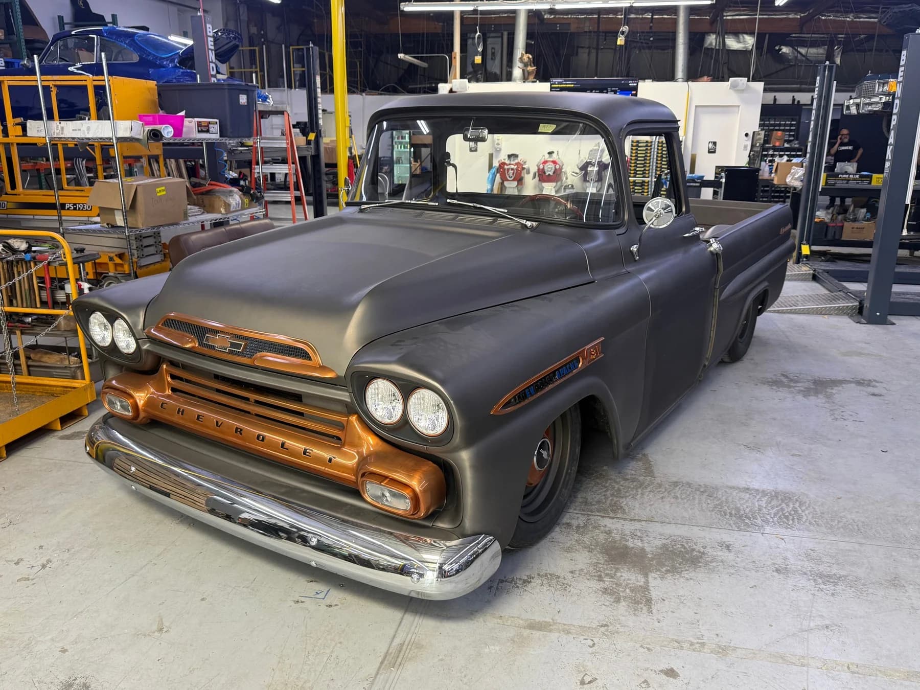 Front three-quarter view of the grey Apache.