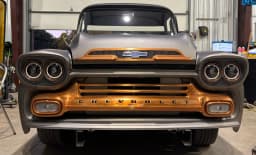 Grille, headlights, and front bodywork.