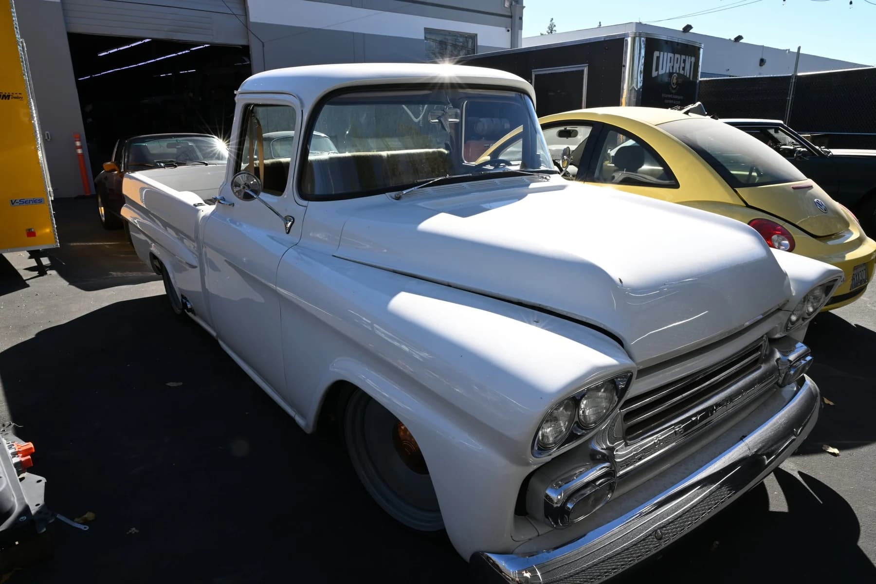 Front three-quarter view of the white Apache outdoors.