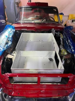 Front battery enclosure installed in the car.
