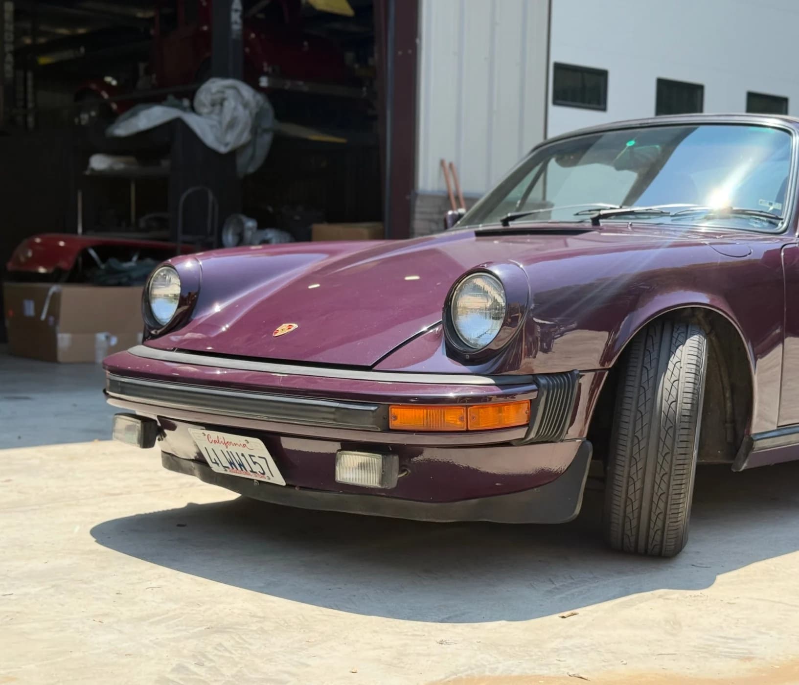 The purple Targa photographed outdoors.