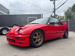 Exterior reference view of the actual red Autozam.