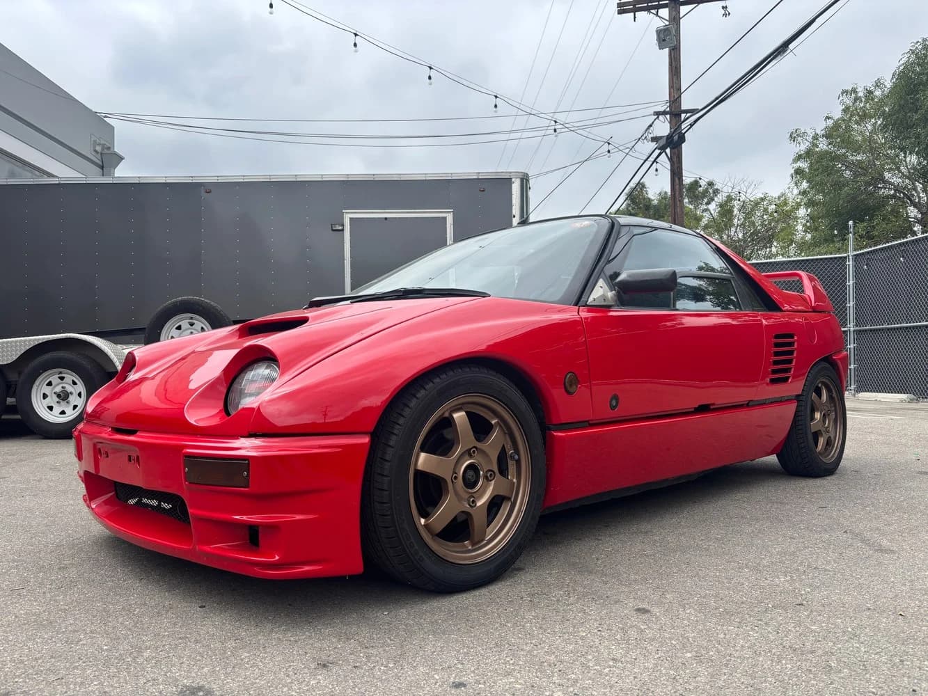 Exterior reference view of the actual red Autozam.