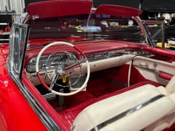 The red-and-white cabin and dashboard.