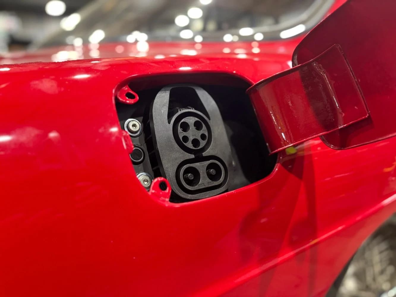 Charging-port integration in the Rivolta.