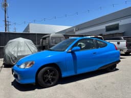 Exterior view of the actual blue Insight.