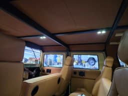 Roof trim and interior lighting in the tan Humvee.