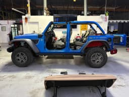 Full side view of the Jeep race-truck project.