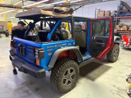 Rear three-quarter view during the build.