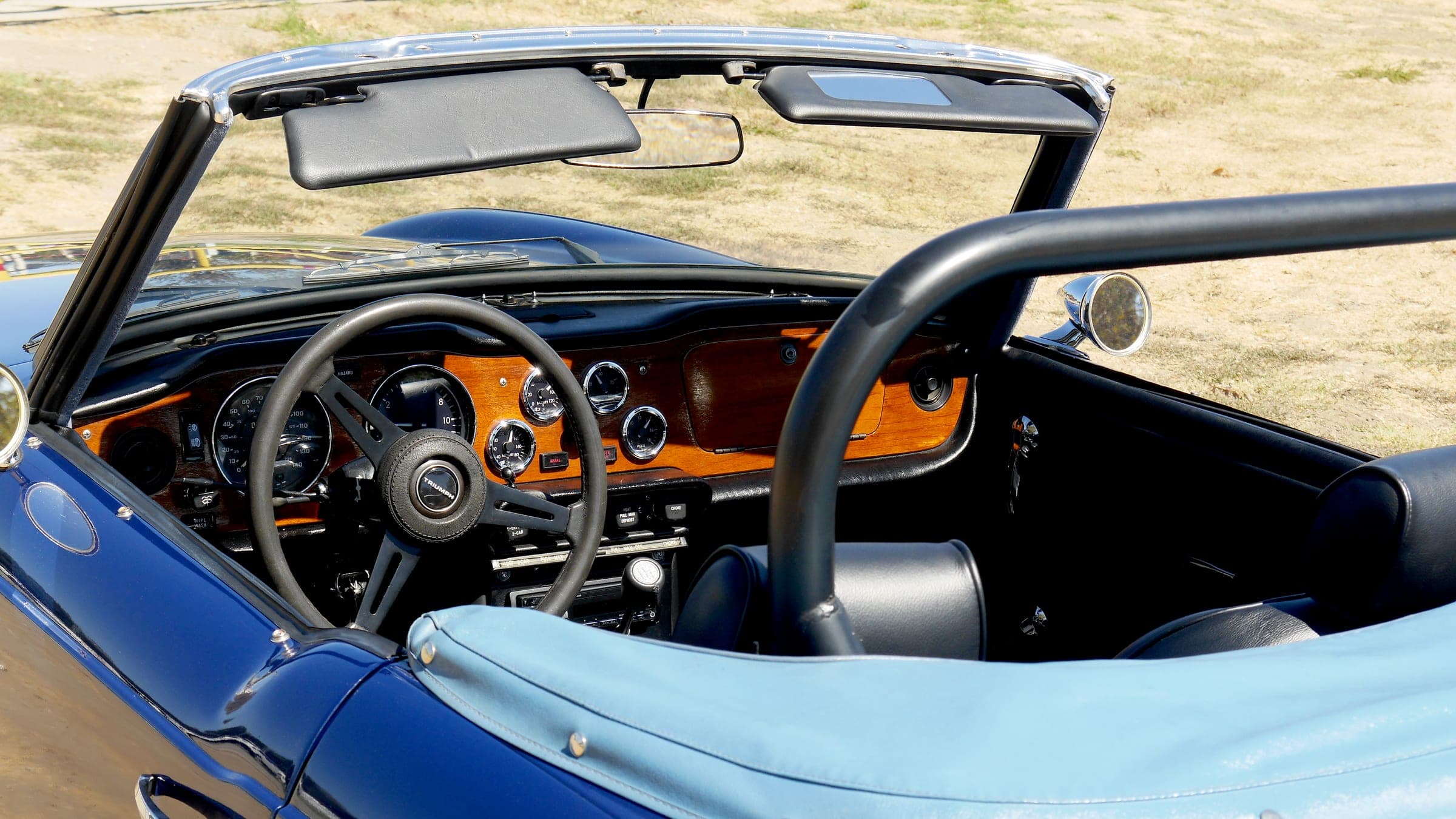 Sun on the dash of our 1974 Triumph TR6